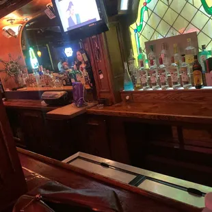 a bar with a television in the background