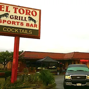 a car parked in front of the restaurant