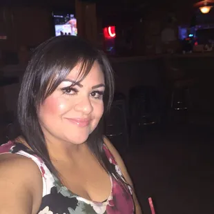 Drinking a Long Island iced tea. This is the karaoke side.