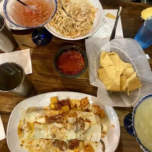 Boss burrito, margaritas, Arroz con Pollo, and chips and salsa