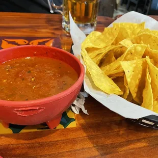 Regular and spicy salsa mixed with chips