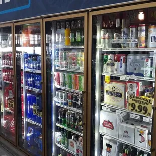 a row of beer coolers