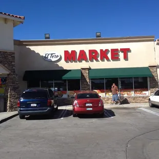 cars parked in front of el toro market