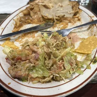 Enchiladas poblano but I had to extract the chicken because the sauce is gross.