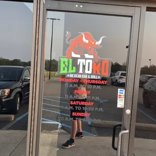 a man standing in front of the door
