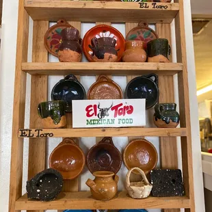 a display of mexican dishes