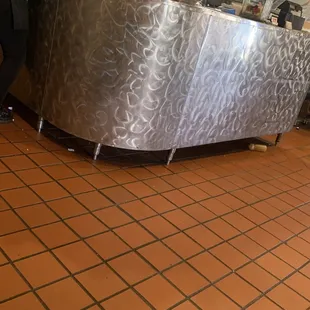 a woman standing at a counter