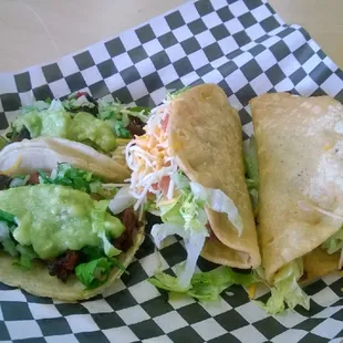 Two Adobada Street Tacos and Two Beef Hard Shell Tacos.