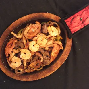 a bowl of shrimp and vegetables