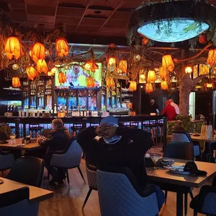 Main bar area as you enter. It&apos;s so warm and inviting.