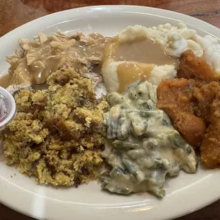 Sunday special turkey and dressing. Includes green bean casserole, sweet potatoes, mashed potatoes with gravy, Mac &amp; Cheese