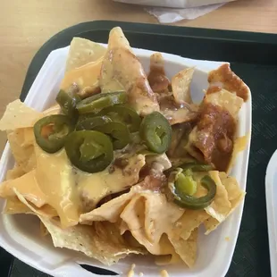 Chips with chili cheese.