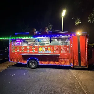 a food truck parked in a parking lot