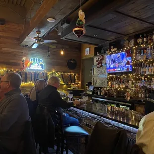 people sitting at a bar