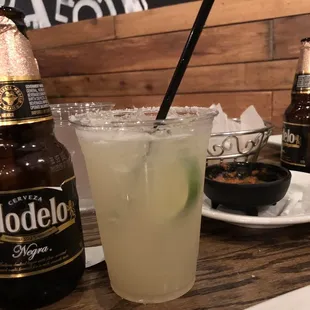 a bottle of modelo and a glass of lemonade