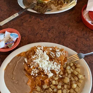 3.99 - Chilaquiles and at the top... El Tri