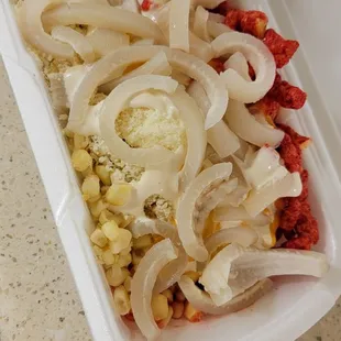 Elote with flaming hot cheetos.  Pork rinds is a must!!