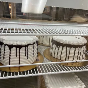 cakes in a display case