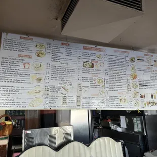 a menu on the wall of a restaurant