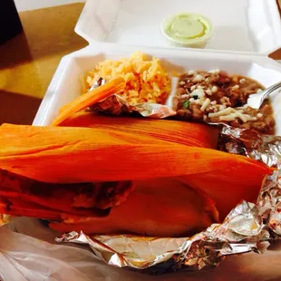 Carnitas tamales with rice &amp; beans.