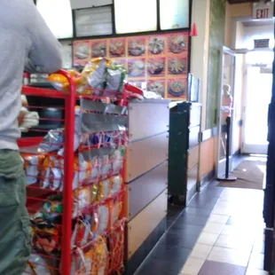 Order from the picture menu board. The place is full of local college student. Always a good sign of good food cheap.