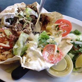 Inside a delicious burrito! With their very spicy but good green salsa