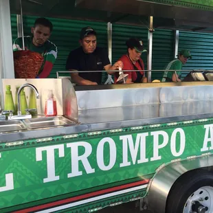 a food truck with people in it