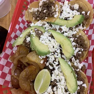 Tacos de Bistec order with Avocado and Queso Fresco