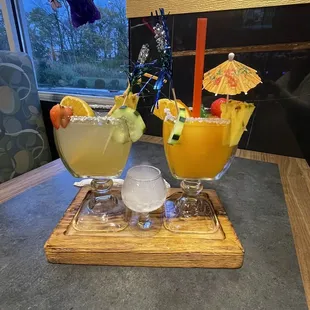 Mango frozen Margarita and lime Margarita on the rocks