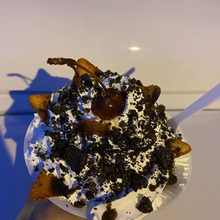 #3: waffle cup, ice cream under an extra generous portion of whipped cream w/ strawberry slices toppings