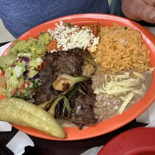 a plate of mexican food on a table