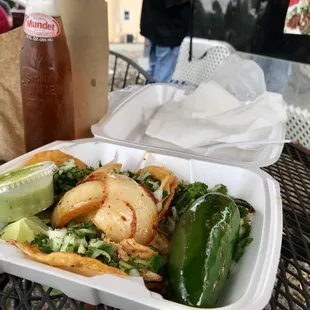 4 tacos and a drink - $12