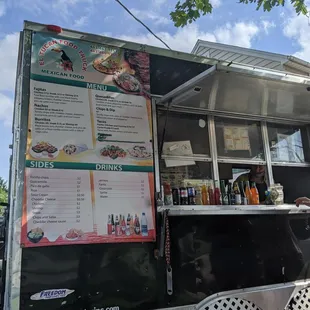 a menu on the side of the truck