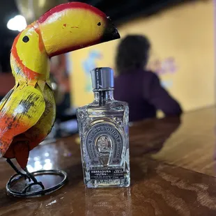 a toucao and a bottle of tequila