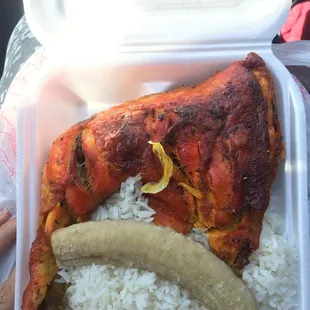 The largest chicken and rice plate you will ever get for  $5 dollars. Comes with a side of beans.