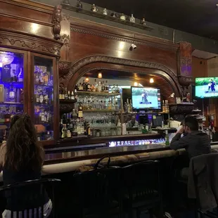 people sitting at the bar