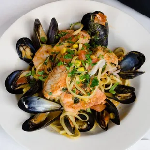 a plate of seafood and pasta