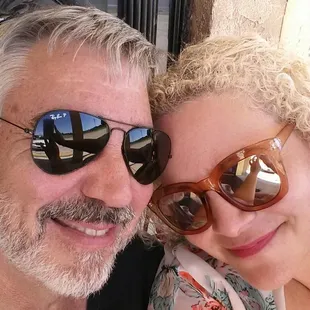 a man and a woman wearing sunglasses