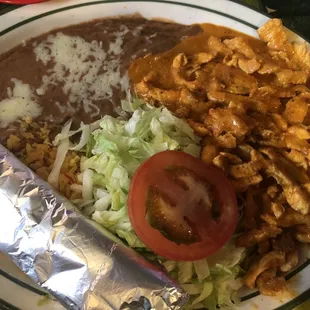 Pollo chipotle with rice, beans, and tortillas