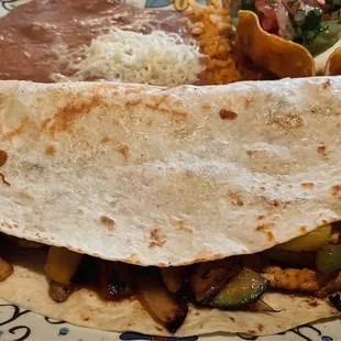 fajita quesadilla with pineapple! the cheese is the highlight :)