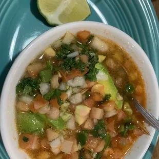 Delicious chicken soup with all your favorite accoutrement. Pairs well with chips and salsa.