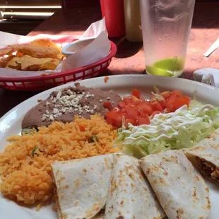 Two chicken quesadillas with beans and rice $7.99