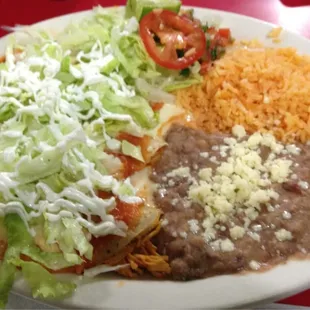 Dinner at El Valle Verde was chicken enchiladas. Came with rice and beans.