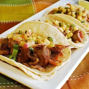 three tacos on a plate