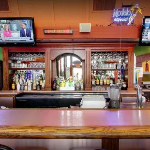 a bar with televisions