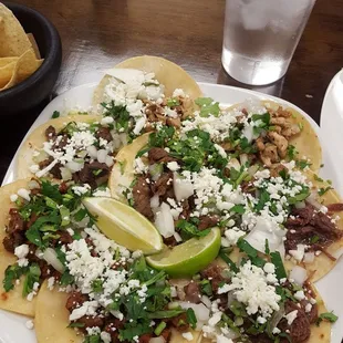 $1 street tacos.  2 beef fajita, 2 chicken fajita, 2 barbacoa,  and 2 el pastor
