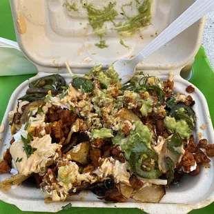 Vegan nachos with adobada.