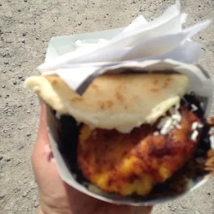 Arepas with beef, plantains and black beans