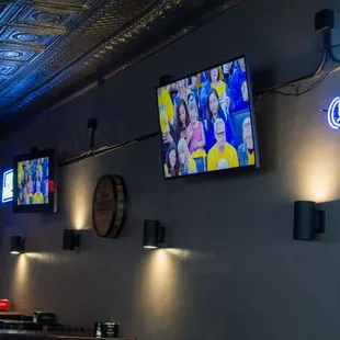 a neon sign and neon signs on the wall