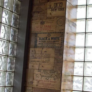 a wall full of old advertisements